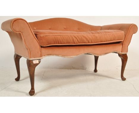 An early 20th century circa 1930’s Queen Anne style window seat / end of bed sofa having red upholstery with buttons raised o