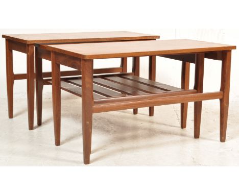 A vintage retro 20th century Danish inspired teak wood nest of tables. The tables of unusual configuration having twin rectan