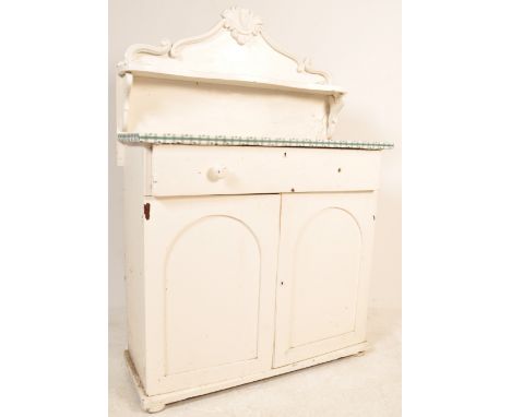 A 19th century Victorian mahogany white painted&nbsp;chiffonier having a shaped top / gallery back over two sort drawers and 