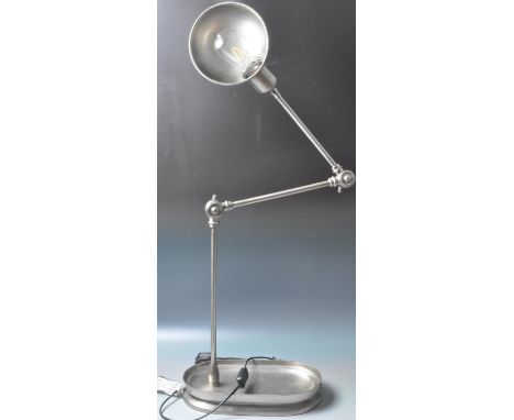A late 20th century circa 1990s industrial style aluminium desk lamp in the manner of Angle Poise, having a bowl shade, adjus