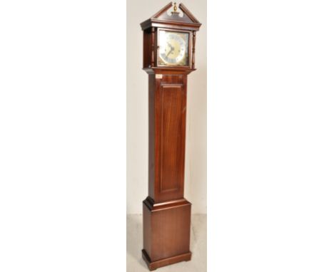 A 20th century Richard Broad - Cornwall mahogany grandmother clock.&nbsp; The clock set in mahogany case, trunk and hood havi