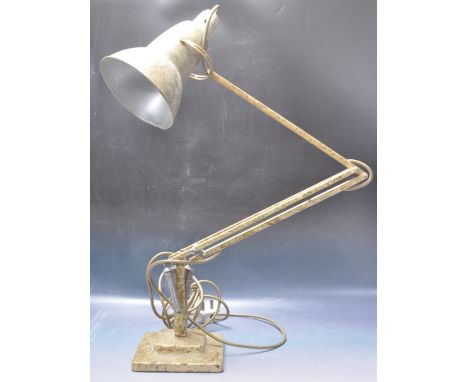 A mid 20th century vintage 1950s Herbert Terry Anglepoise model 1227 desktop lamp having a conical lightshade with cooling ho