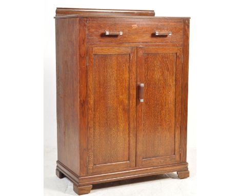 An early 20th century circa 1930’s Art Deco tallboy. The tallboy having a small gallery back with single drawer over twin dra