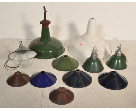 A collection of 20th century 1970s retro industrial pendant enamelled pendant lampshades comprising of a group of UFO saucer 