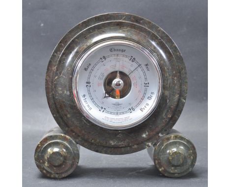 An early 20th century 1930s Art Deco British made Shortland barometer in a circular marble case with decorative feet. Measure