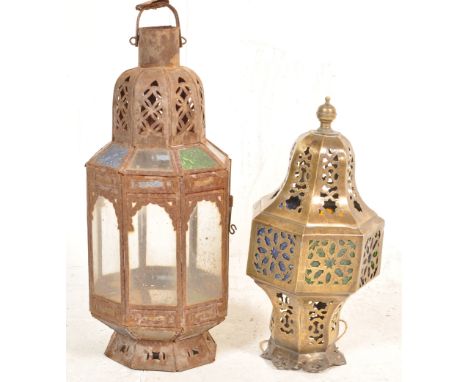 Two 20th century metal and glass Moroccan style lanterns / porch lantern with pierced body and glass panels.54cm x 19cm&nbsp;