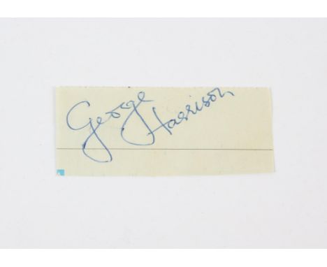 George Harrison (The Beatles) A vintage signed white lined page, 3 x 8 cm. 