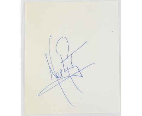 Neil Armstrong signed album page. Neil Armstrong (1930 - 2012) was an American astronaut and aeronautical engineer who became