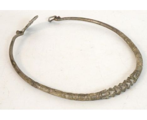 VINTAGE NEPALESE WHITE METAL HANSULI TORQUE
with engraved decoration and shaped clasp