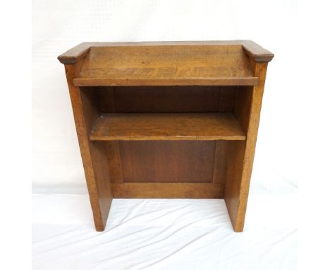 ECCLESIASTICAL OAK LECTERN
with a sloping fall above a shelf and a panelled front, 79cm x 91cm
   