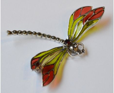 SILVER, MARCASITE, GEM AND ENAMEL DECORATED BROOCH
formed as a dragonfly with wings divided into colourful sections