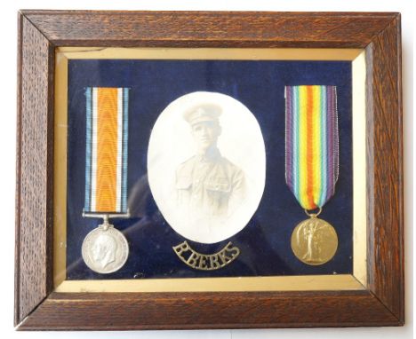 1914-18 BRITISH WAR AND VICTORY MEDALS
named to '43266 Pte.A.G.McDougall. R.Berks.R.', mounted together with military portrai
