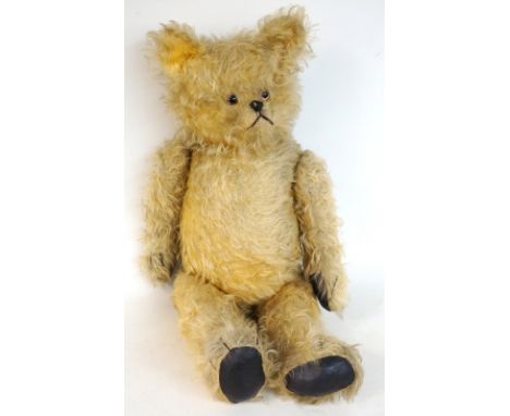 LARGE GOLD PLUSH TEDDY BEAR 
with button eyes and articulated limbs, 80cm high 
