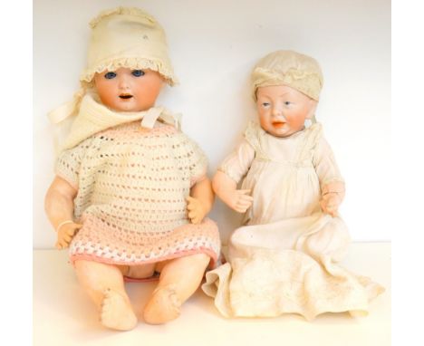 TWO GERMAN BISQUE HEADED DOLLS
one a Kammer & Reinhardt Kaiser-Baby doll with painted eyes and open mouth, marked K&R with si