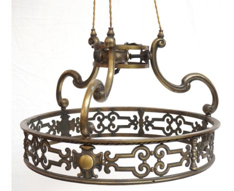 BRASS CIRCULAR CEILING LIGHT FITTING
with rails decorated with stylized motifs with three shaped arms supporting a central fi