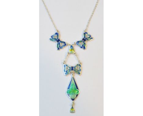 ATTRACTIVE ART NOUVEAU STYLE SILVER AND ENAMEL DROP PENDANT
the enamel decorated sections of bow and other shaped forms, on a