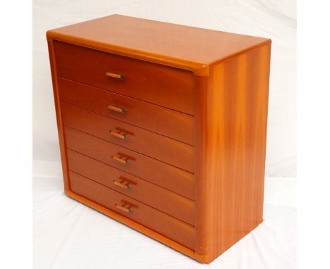 CHERRY WOOD CHEST OF DRAWERS
the six long drawers with decorative handles, together with an associated triple arched mirror b