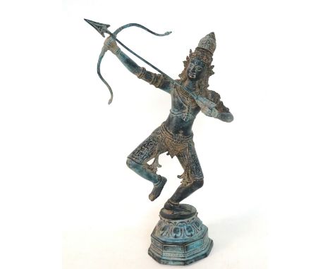 INDIAN COPPER FIGURE OF RAMA
standing on one leg, the other raised, with his bow and arrow poised, raised on an hexagonal bas