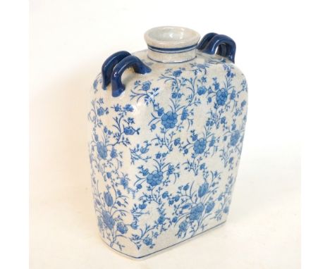 CHINESE STYLE PORCELAIN FOUR HANDLED FLASK
the body with floral decoration, 24cm high