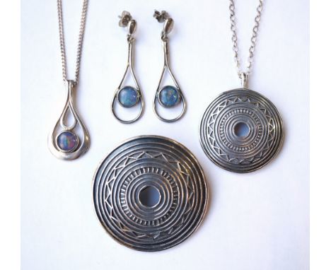 COLLECTION OF SILVER ORTAK JEWELLERY IN BOXES
comprising an opal set pendant on chain with matching earrings; and a circular 