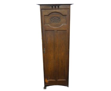 ART NOUVEAU OAK HALL WARDROBE
originally part of a hallstand, with shaped top, the door with carved upper panel, shelved inte