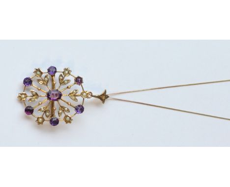 EDWARDIAN AMETHYST AND SEED PEARL BROOCH/PENDANT
in pierced nine carat gold setting and on nine carat gold chain
