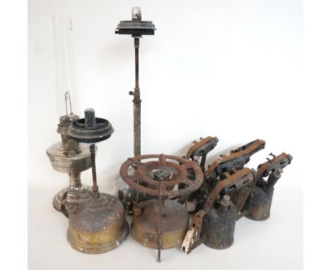 ALADDIN OIL LAMP
with a polished shaped steel body and glass stack, together with a column oil lamp with a brass domed reserv