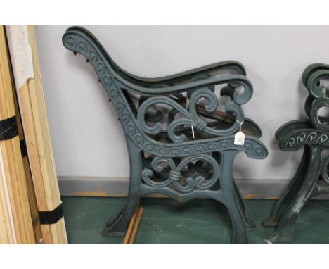 Pair of cast bench ends