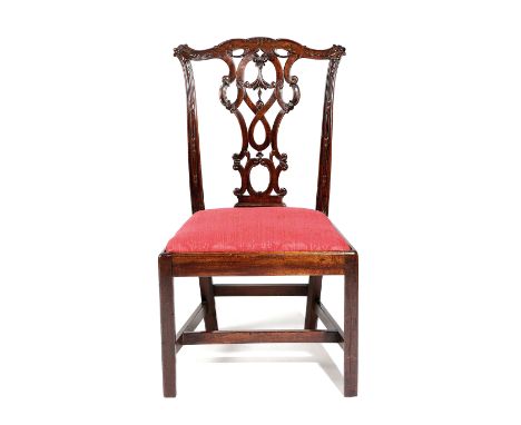 A GEORGE III MAHOGANY SIDE CHAIR CHIPPENDALE PERIOD, C.1760-70 the serpentine top rail carved with 'C' scrolls, husks and lea