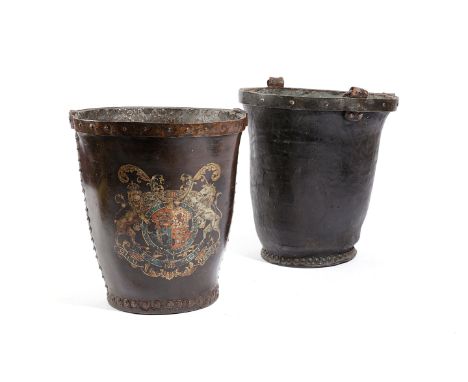 TWO LEATHER FIRE BUCKETS LATE 18TH CENTURY AND LATER one emblazoned with the Royal Coat of Arms, the other with a strap handl