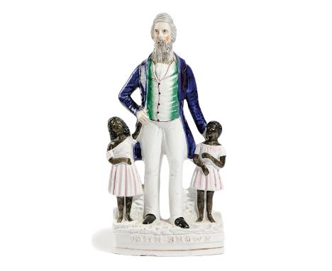 A RARE STAFFORDSHIRE POTTERY FIGURE OF JOHN BROWN c.1860 modelled with the American slavery abolitionist standing accompanied
