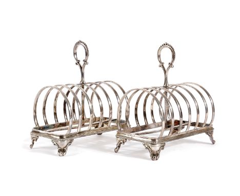 A PAIR OF LATE-VICTORIAN SILVER SEVEN-BAR TOAST RACKS BY HENRY WILKINSON AND CO. SHEFFIELD 1893 rectangular form, plain arche