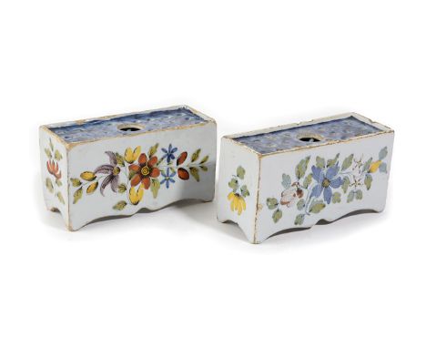 A PAIR OF DELFTWARE POTTERY POLYCHROME FLOWER BRICKS ATTRIBUTED TO LIVERPOOL, C.1760 painted in the Fazackerly palette in blu