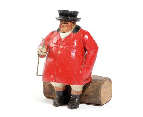 A CARVED AND PAINTED WOOD FIGURE OF A HUNTSMAN IN THE MANNER OF FRANK WHITTINGTON OF FOREST TOYS, EARLY 20TH CENTURY the rotu