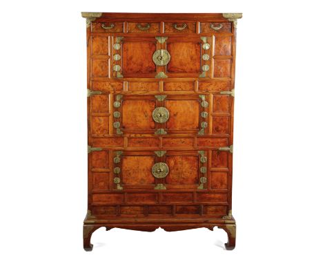 A KOREAN ELM AND BURR ELM CABINET 19TH CENTURY with brass mounts and handles, with four frieze drawers, above three cupboards