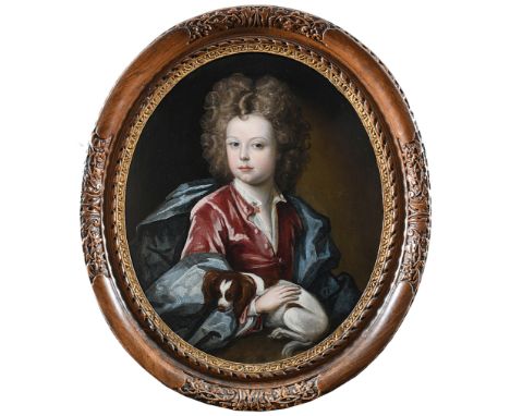 ATTRIBUTED TO EDWARD BYNG (1676-1756) Portrait of a boy holding a spaniel, possibly a member of the Popham family of Littleco