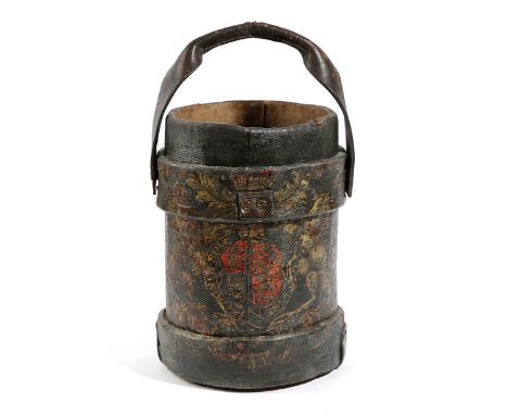 A CANVAS SHELL CASE WASTE PAPER BASKET painted blue and emblazoned with a polychrome Royal Coat of Arms, with a leather handl