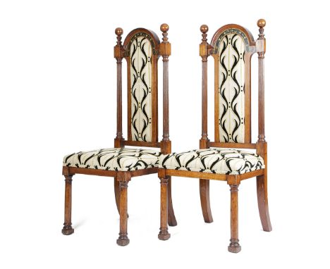 A PAIR OF MASONIC OAK HIGHBACK SIDE CHAIRS FIRST HALF 19TH CENTURY each with an arched back, painted in gilt with a scroll, d