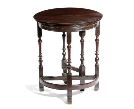A RARE QUEEN ANNE OAK DEMI-LUNE SIDE TABLE EARLY 18TH CENTURY with a single drop-leaf on a single gate support, with a hinged