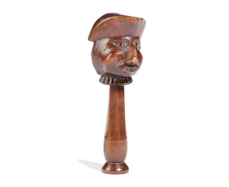 A SWISS TREEN NOVELTY NUTCRACKER 19TH CENTURY carved as a bust of a man wearing a tricorn hat, with a screw action 15.7cm hig