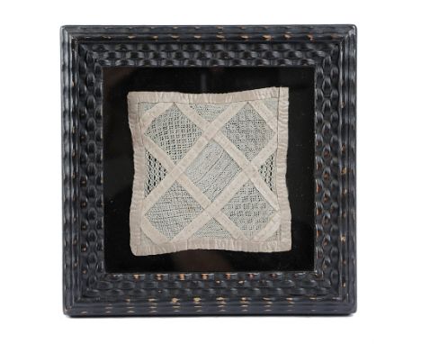A GEORGE III HOLY POINT NEEDLE LACE SQUARE BY MARGARET DAVISON with a lattice design created by applied cream silk slips, wor