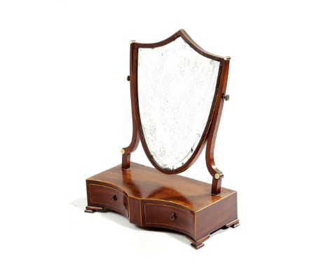 A GEORGE III MAHOGANY DRESSING TABLE MIRROR C.1790-1800 with boxwood stringing, the shield shaped bevelled plate above a serp