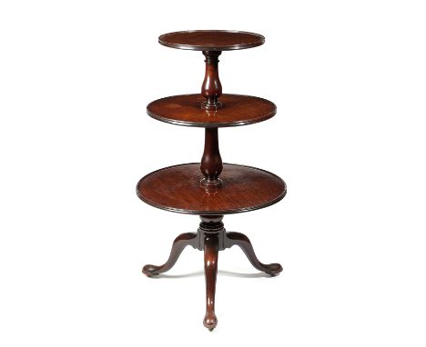 A GEORGE III MAHOGANY DUMB WAITER LAST QUARTER 18TH CENTURY with three graduated dished revolving tiers and a baluster turned