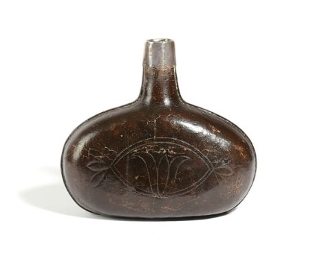 A LEATHER FLASK LATE 17TH CENTURY of onion wine bottle form, with a silver rim (unmarked), the body decorated either side wit