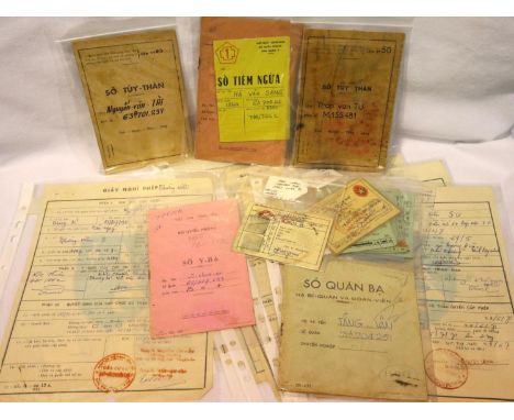 A collection of Vietnam War period ephemera consisting of some ARVE leave passes and passes into the US Air bases in Saigon a
