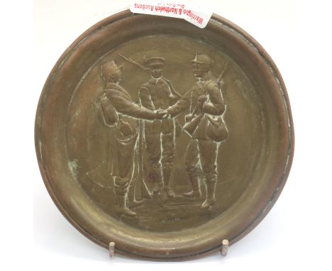 Small brass military plaque stamped B&amp;D copyright, D: 14 cm. P&amp;P Group 1 (£14+VAT for the first lot and £1+VAT for su