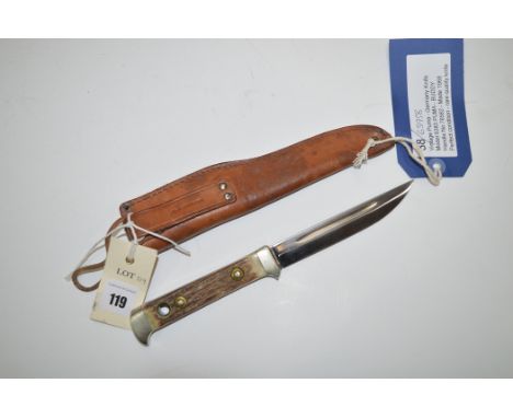 A Puma of Germany "Buddy" hunting knife model 6383, handle No.76582 manufactured 1968 in Puma leather sheath.