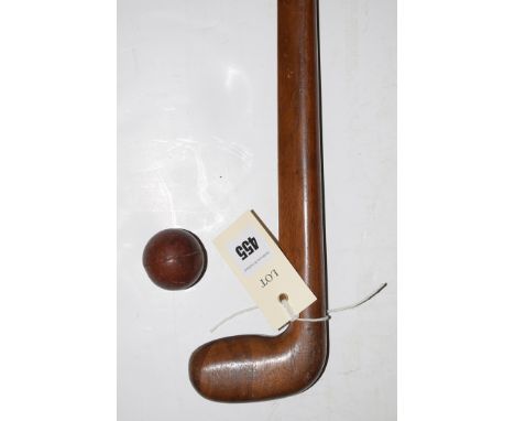 A Sunday golf walking stick, 86.5cms long; together with a Gutta-Percha golf ball.  (2)