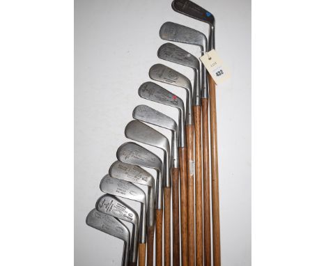 Twelve hickory shafted rustless irons, to include: 2, 3 and 4 irons and putters, by J. Murray, Pitlochry; Hardy Brothers, Edi
