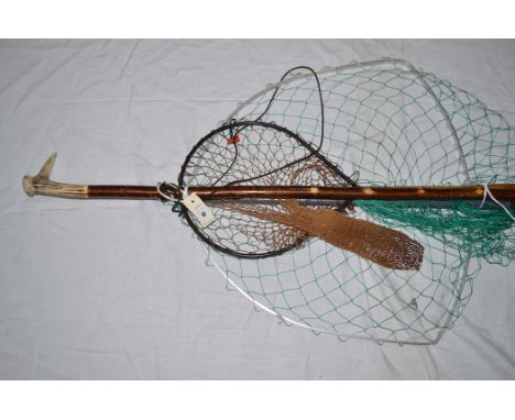 A handmade wading stick with staghorn handle; a Vintage landing net with wooden handle; and a large modern folding net.  (3)